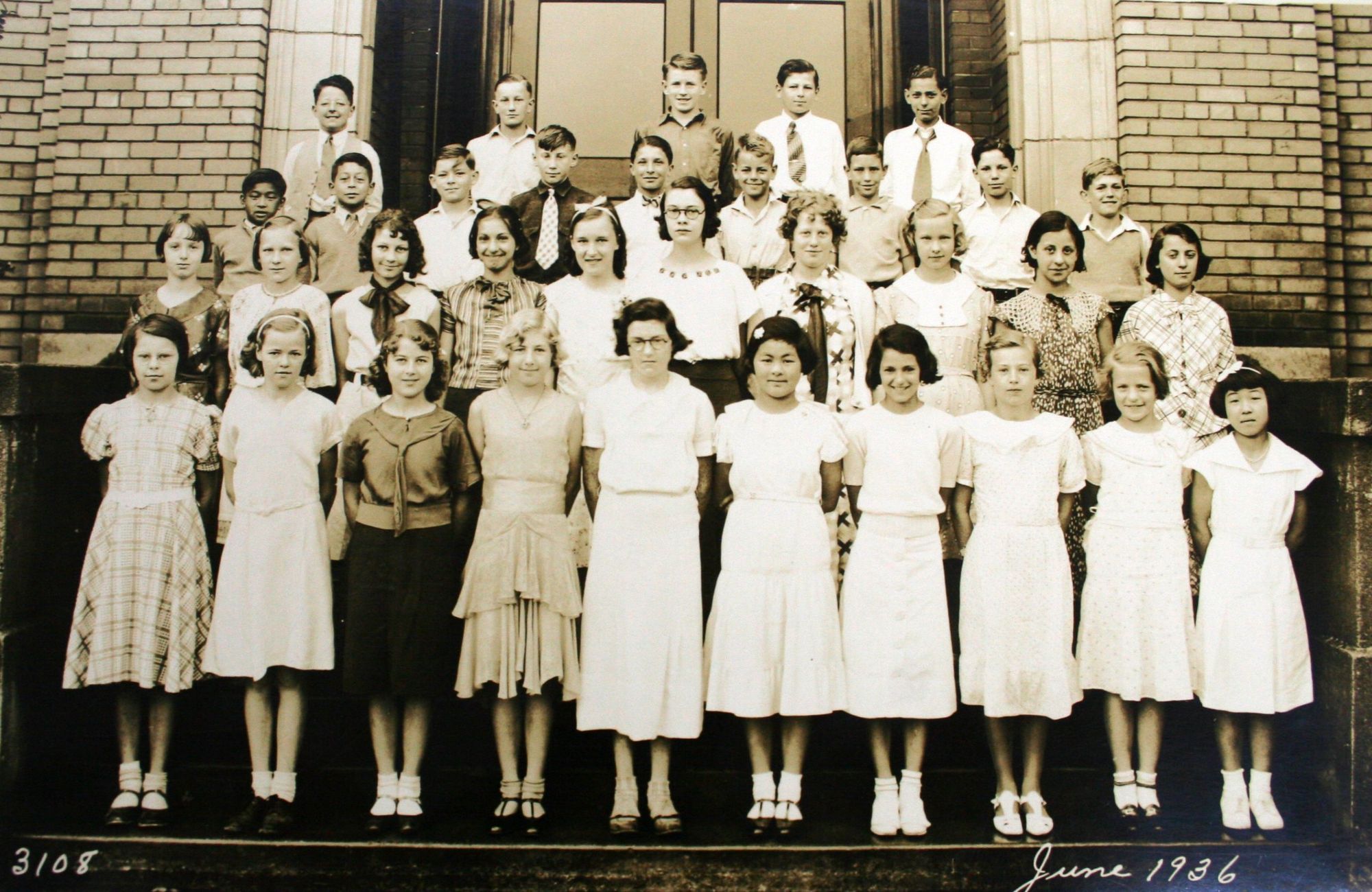 Class portrait, June 1936, on the main stair.
